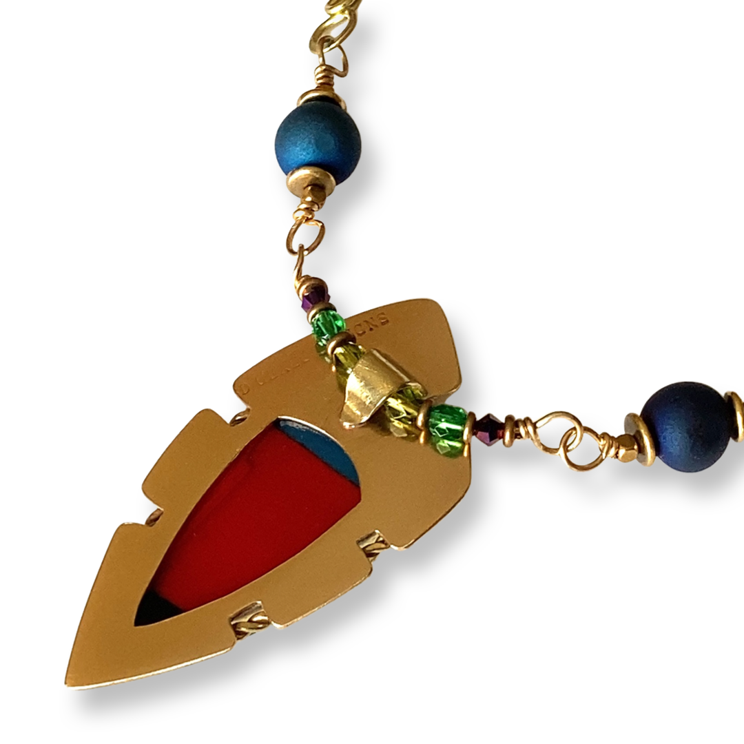 Back side of brass and dichroic glass pendant with handmade beaded chain. By 3D Glass Designs.