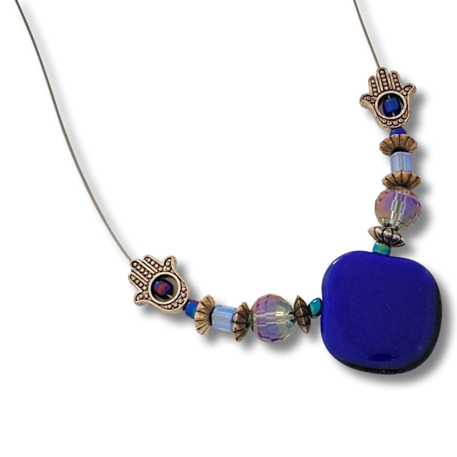 Blue beaded pendant necklace on a white background, by 3D Glass Designs.