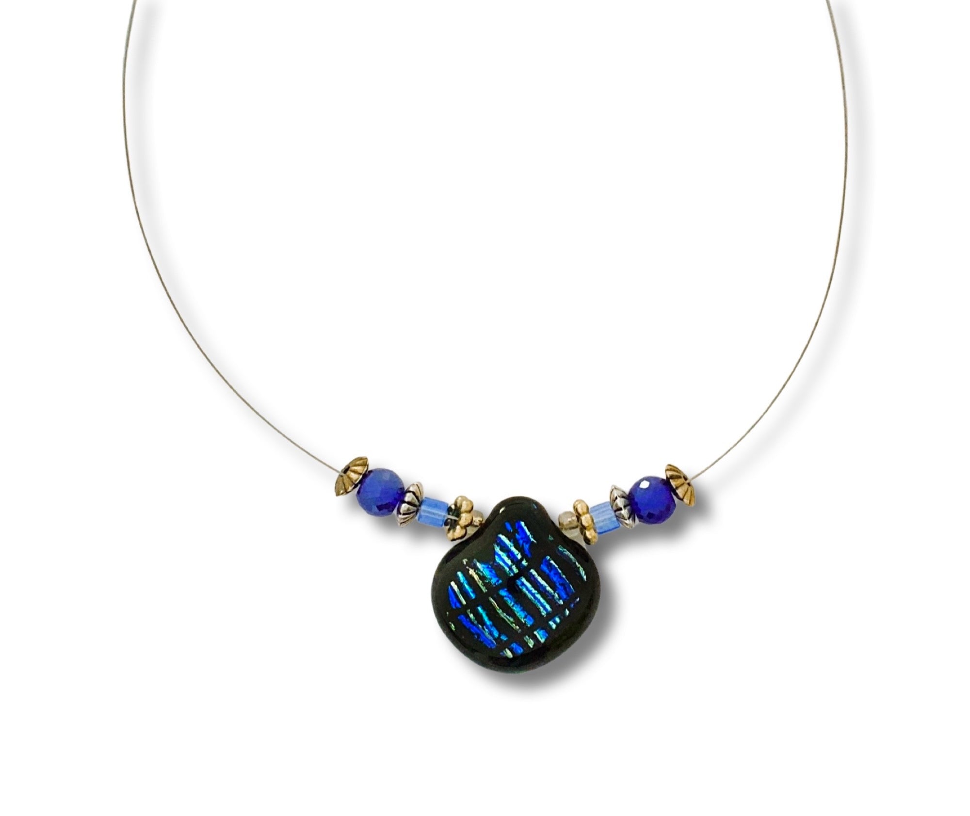 Dainty beaded necklace with blue striped dichroic glass pendant against a white background, by 3D Glass Designs.