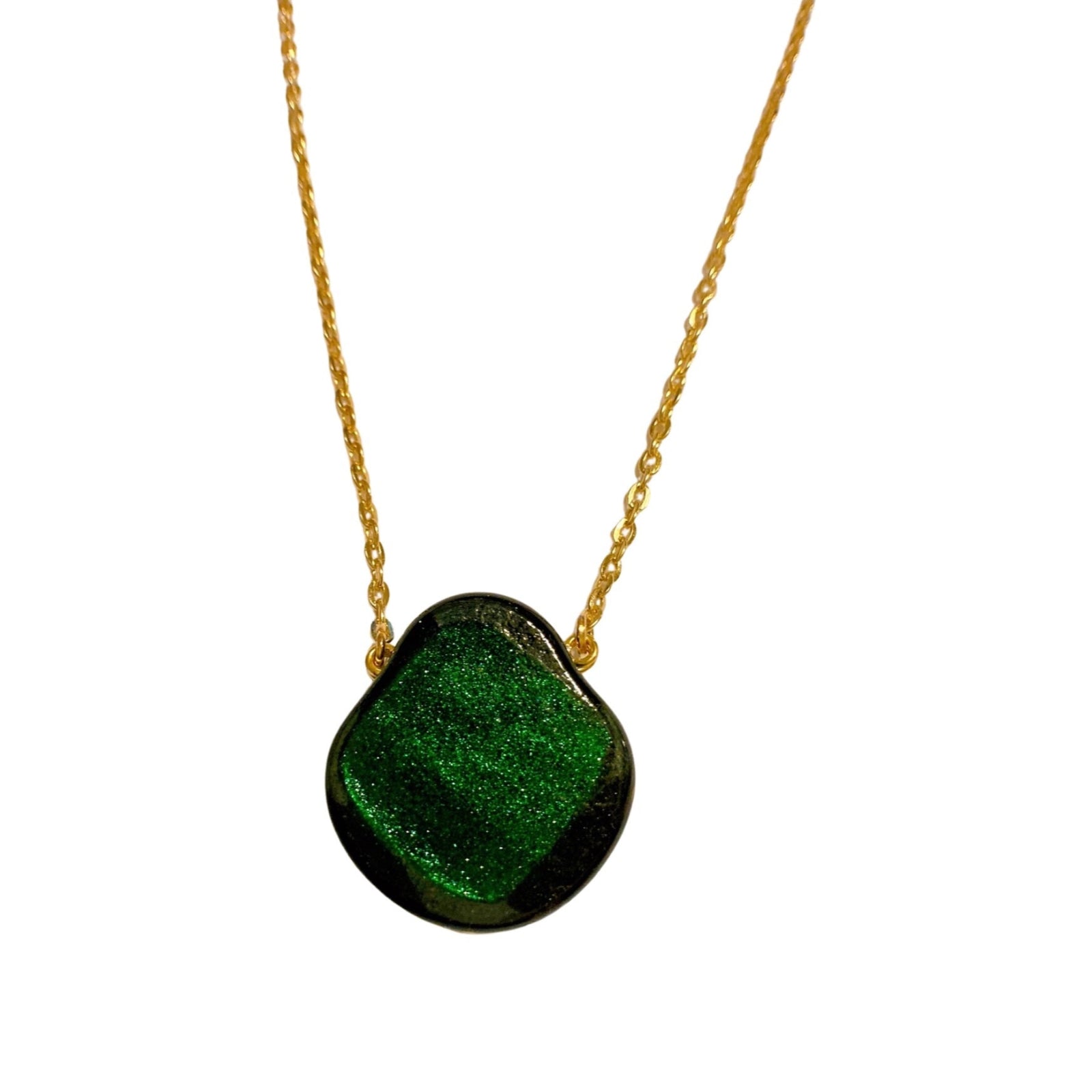 Green fused glass on a gold chain.