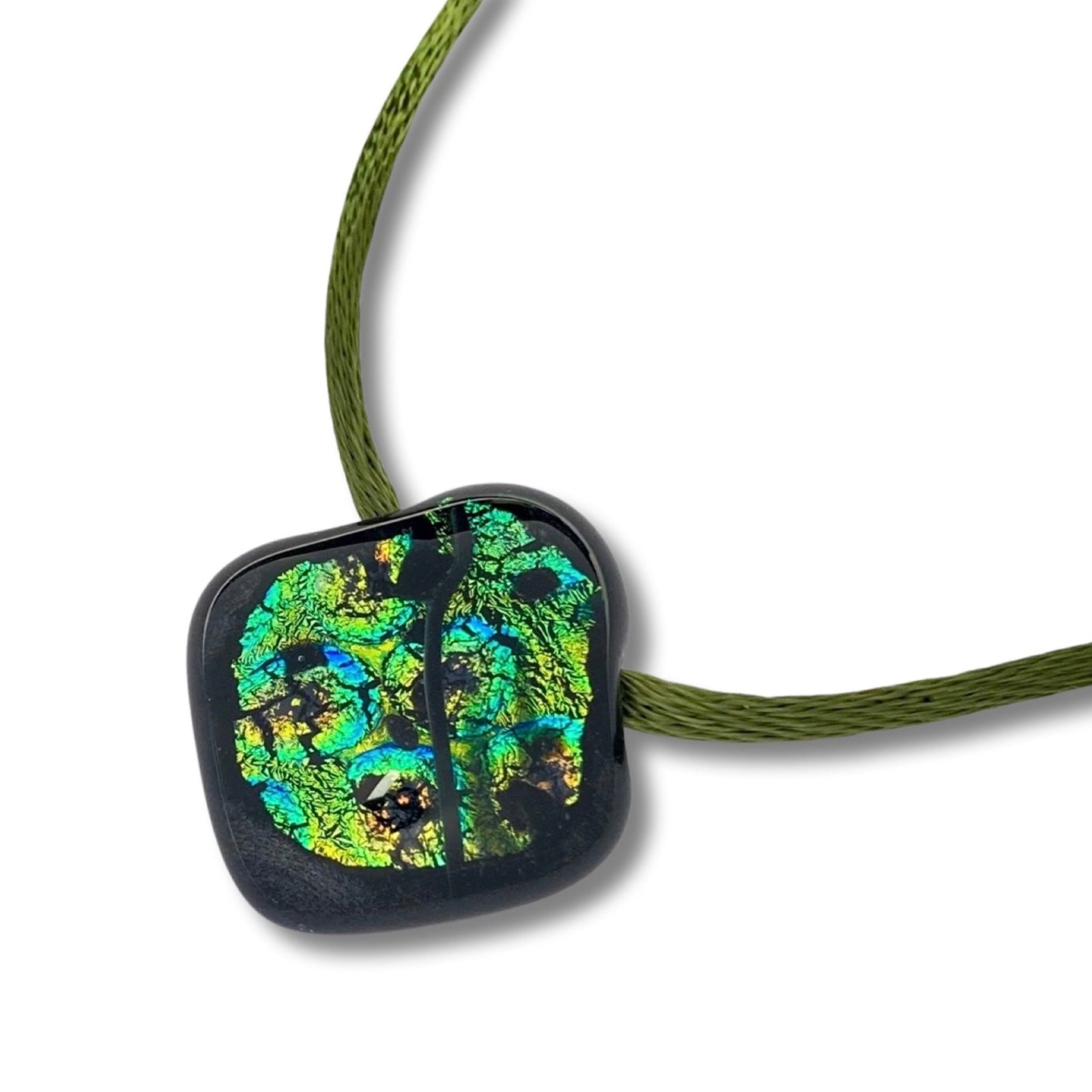 Green glass pendant on an olive-green satin cord against a white background, by 3D Glass Designs.