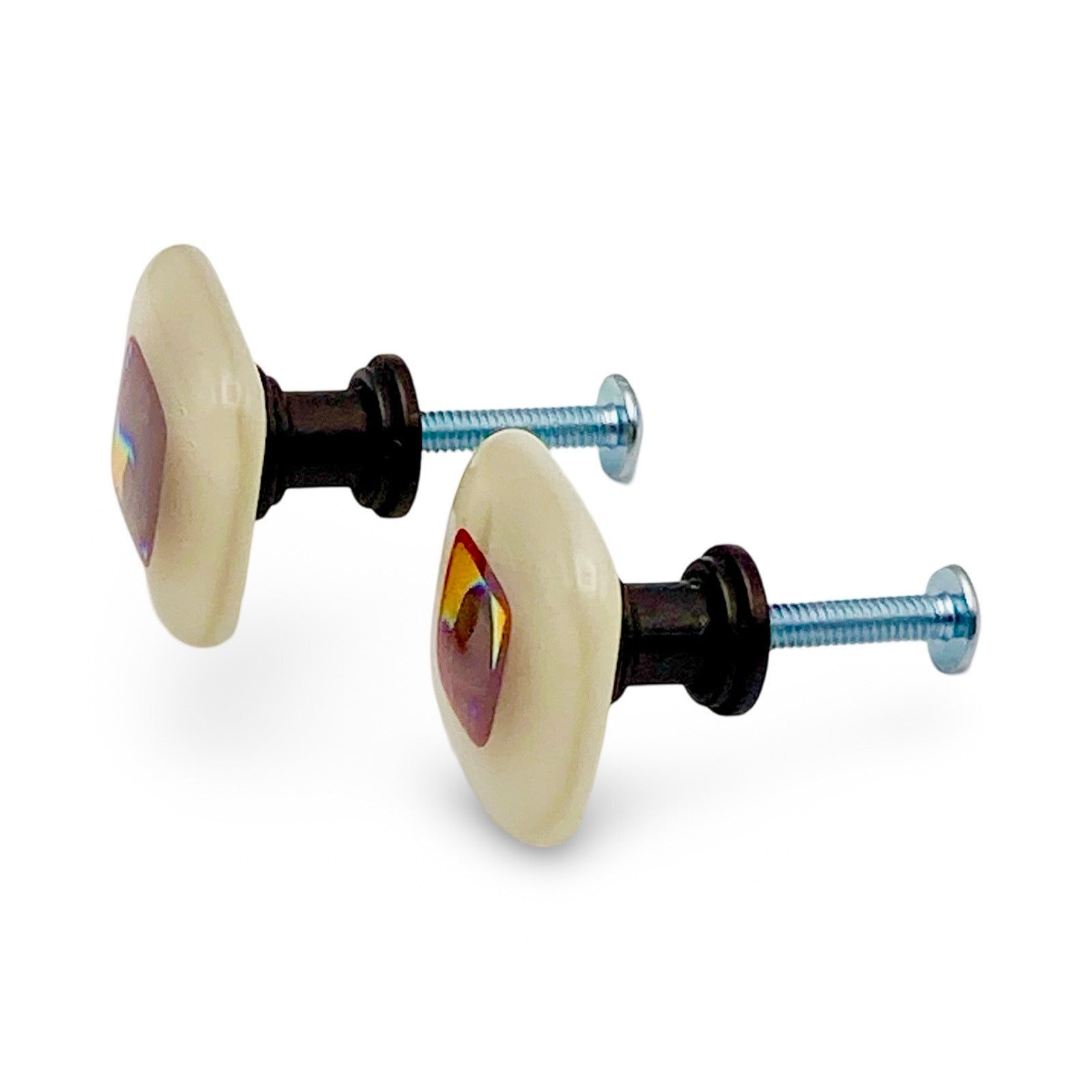 A pair of fused glass furniture knobs, by 3D Glass Designs.