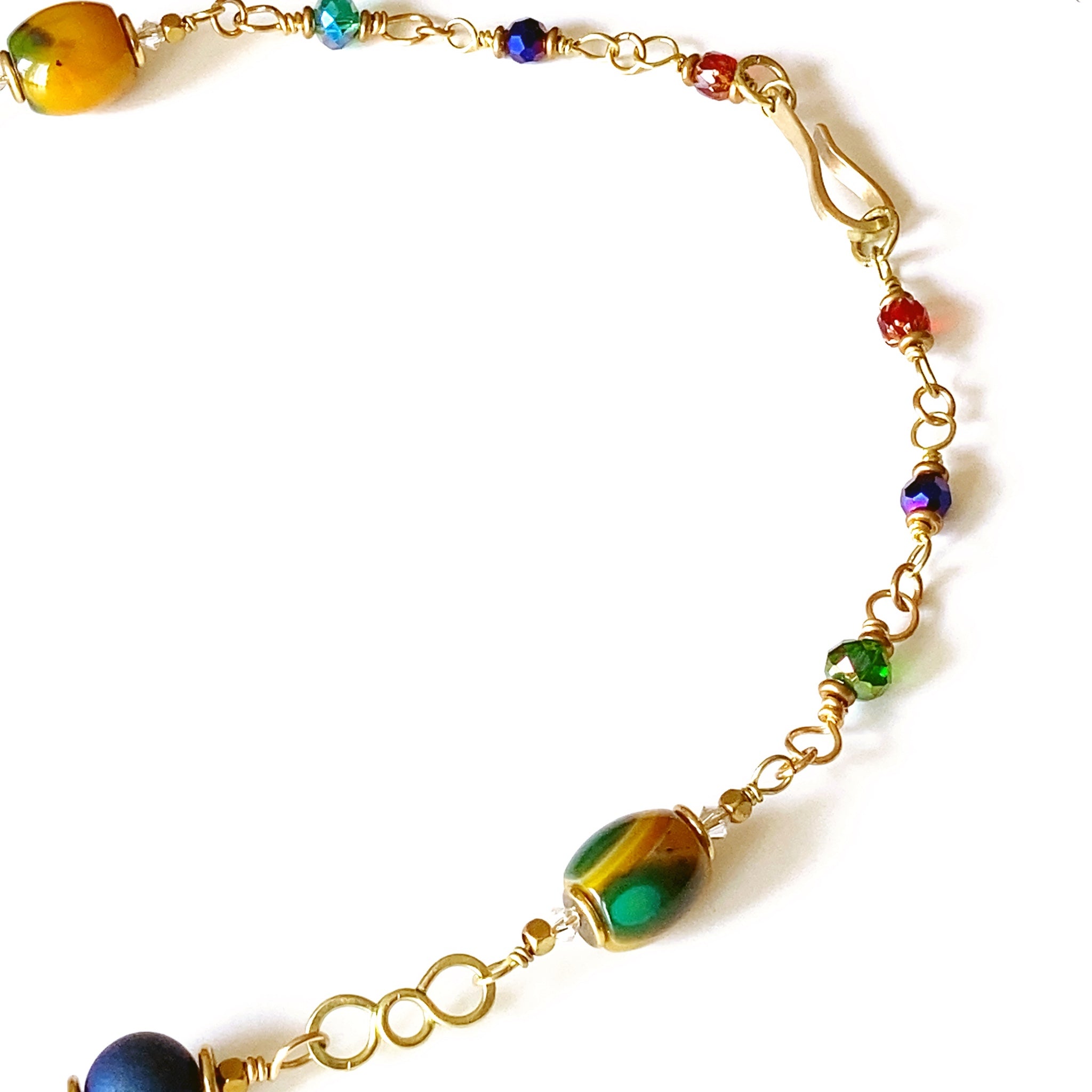 Partial details of handmade beaded link necklace and clasp.