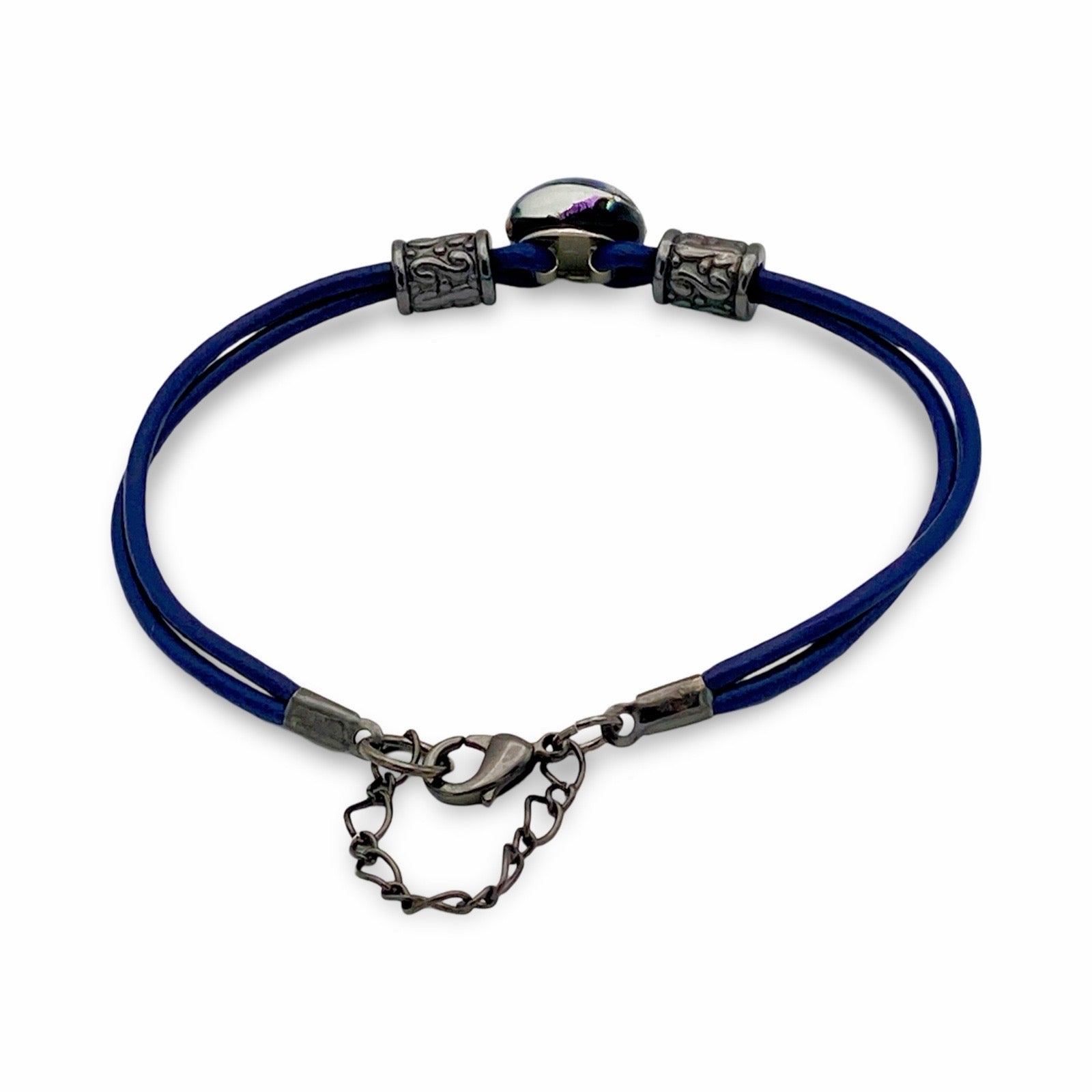Back of handmade purple dichroic glass and blue leather bracelet, by 3D Glass designs.