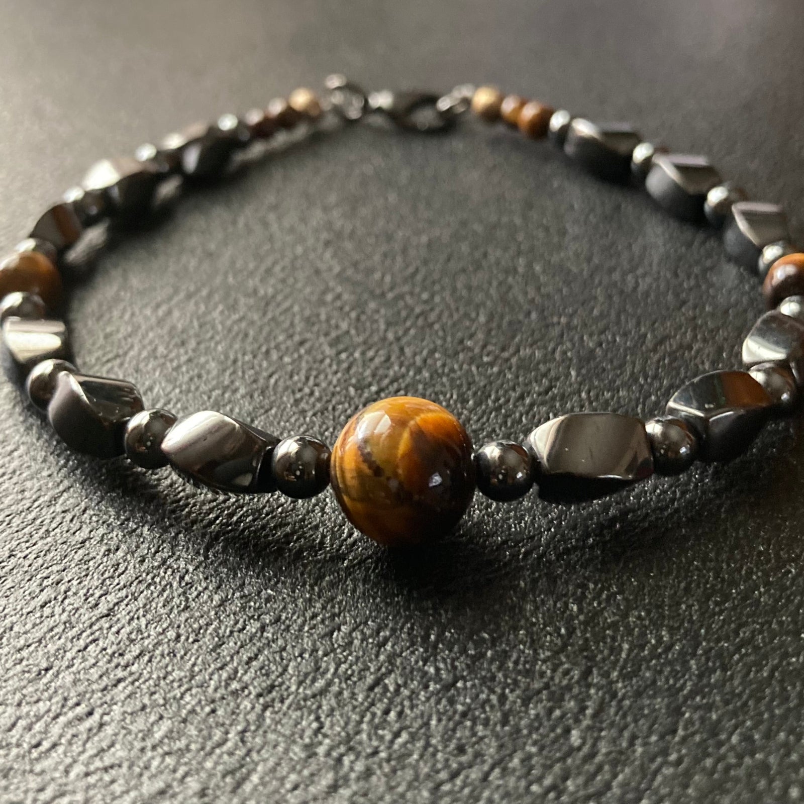 Men's hematite and tiger's eye beaded bracelet by 3D Glass Designs.