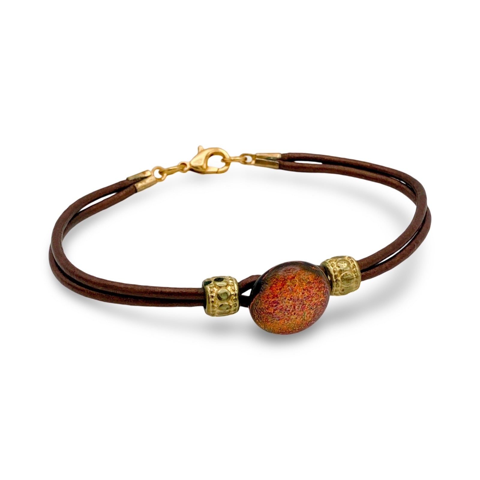 Leather bracelet with dichroic glass cabochon, by 3D Glass Designs.