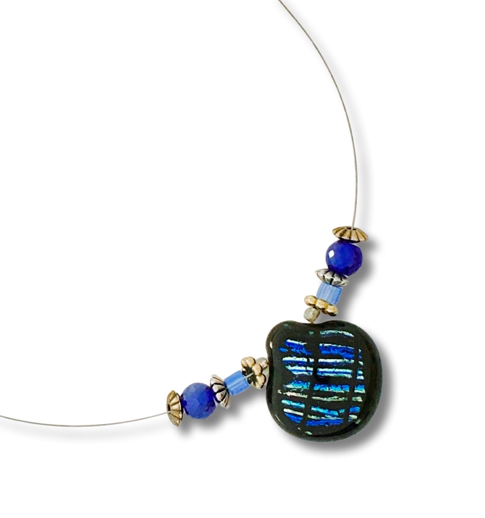Illusion style beaded necklace with blue striped dichroic glass pendant against a white background, by 3D Glass Designs.