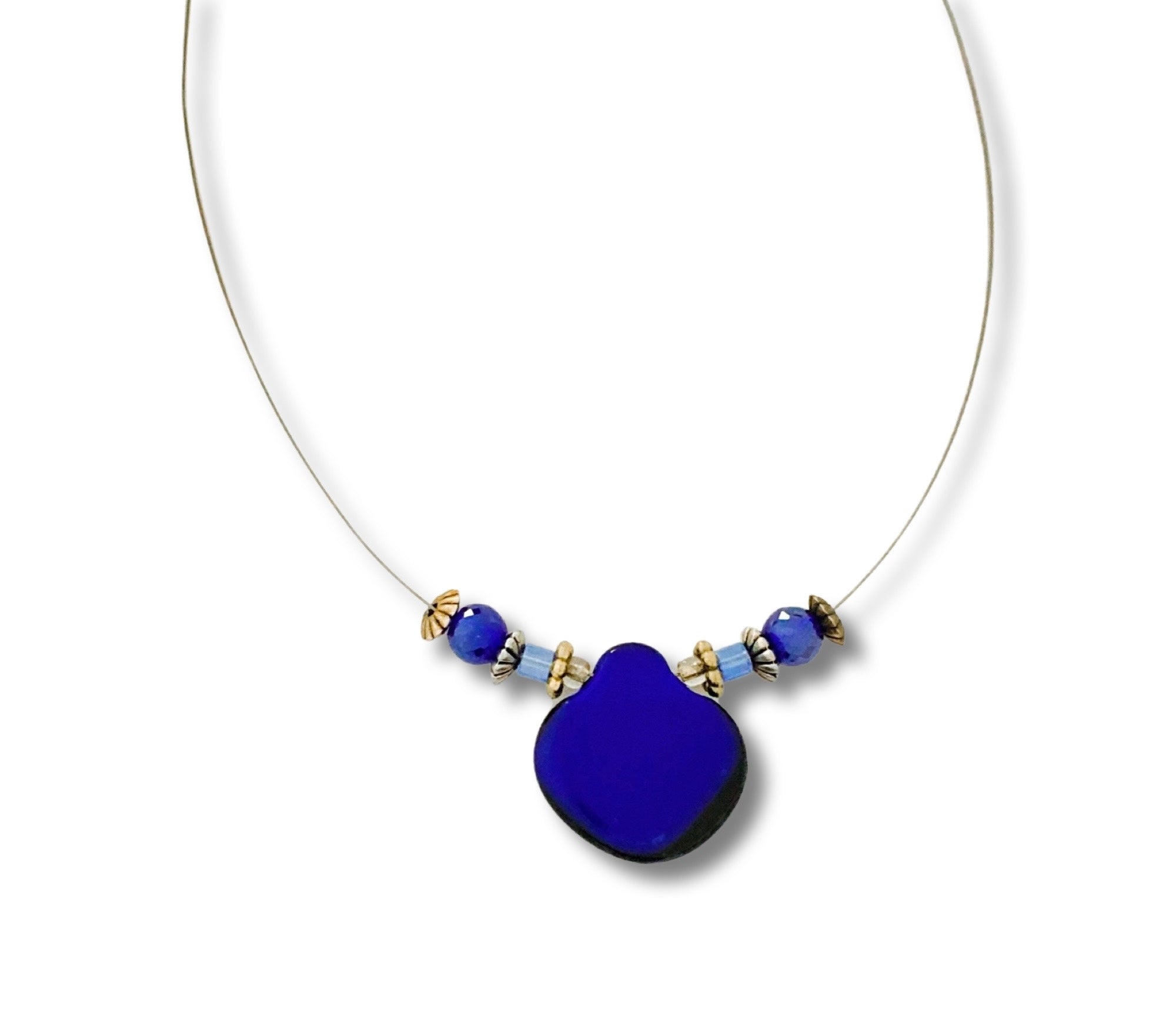 Beaded necklace with vibrant blue glass pendant against a white background, by 3D Glass Designs.