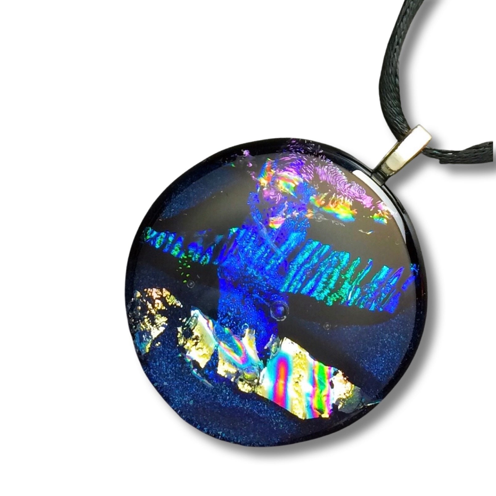 Round dichroic glass pendant in midnight blue, purple, silver and teal, by 3DGlass Designs.