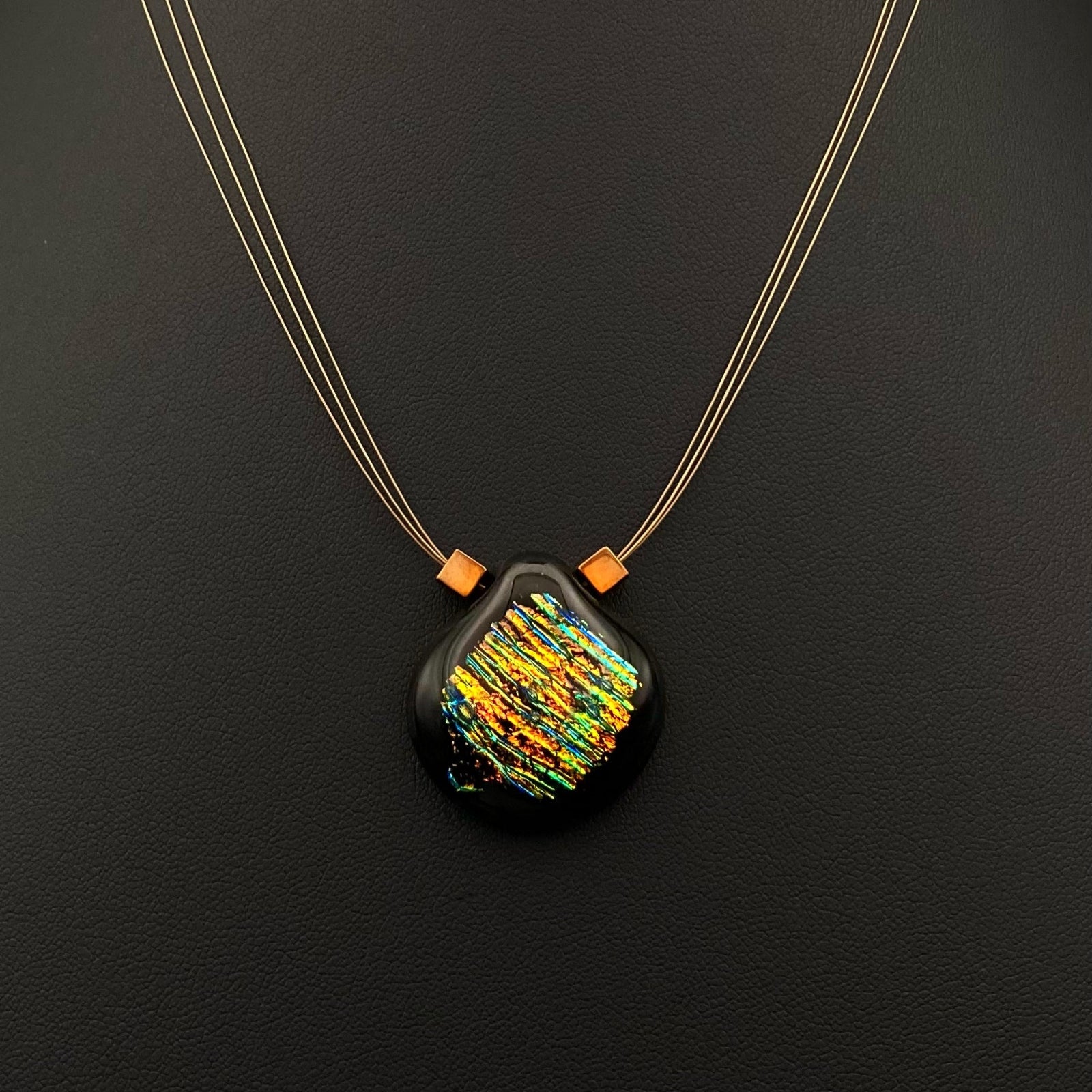 Fused glass pendant on a delicate three-cord necklace, by 3D Glass Designs.