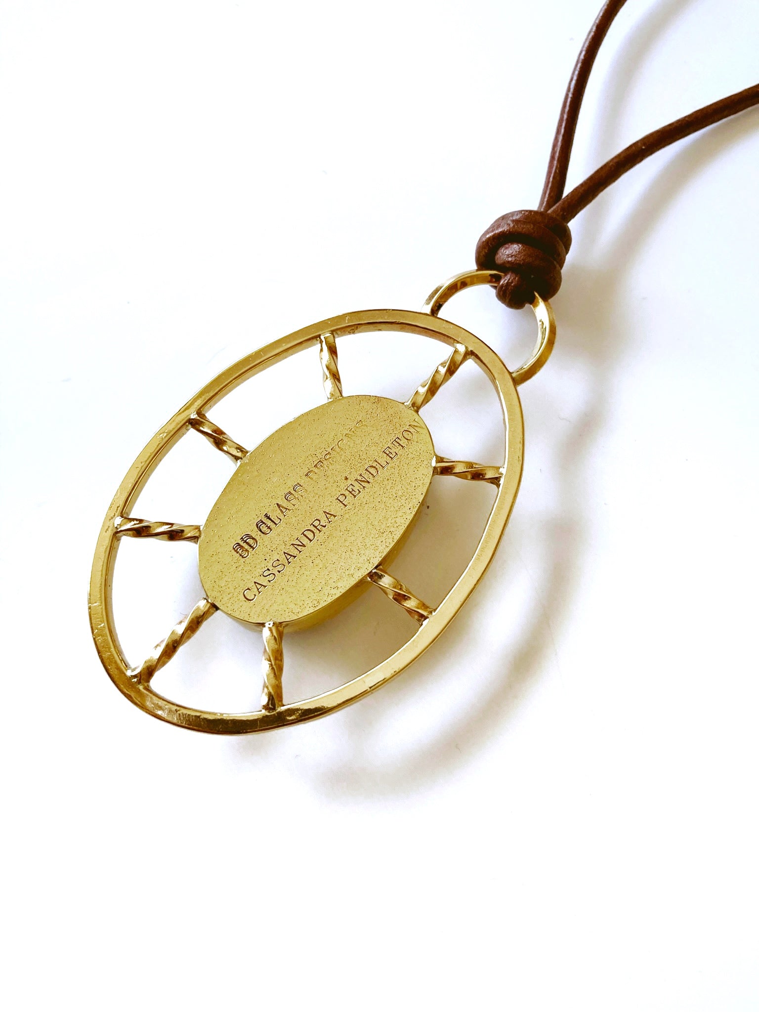 Backside of the nautical inspired fused glass and brass Pendant, by 3D Glass Designs