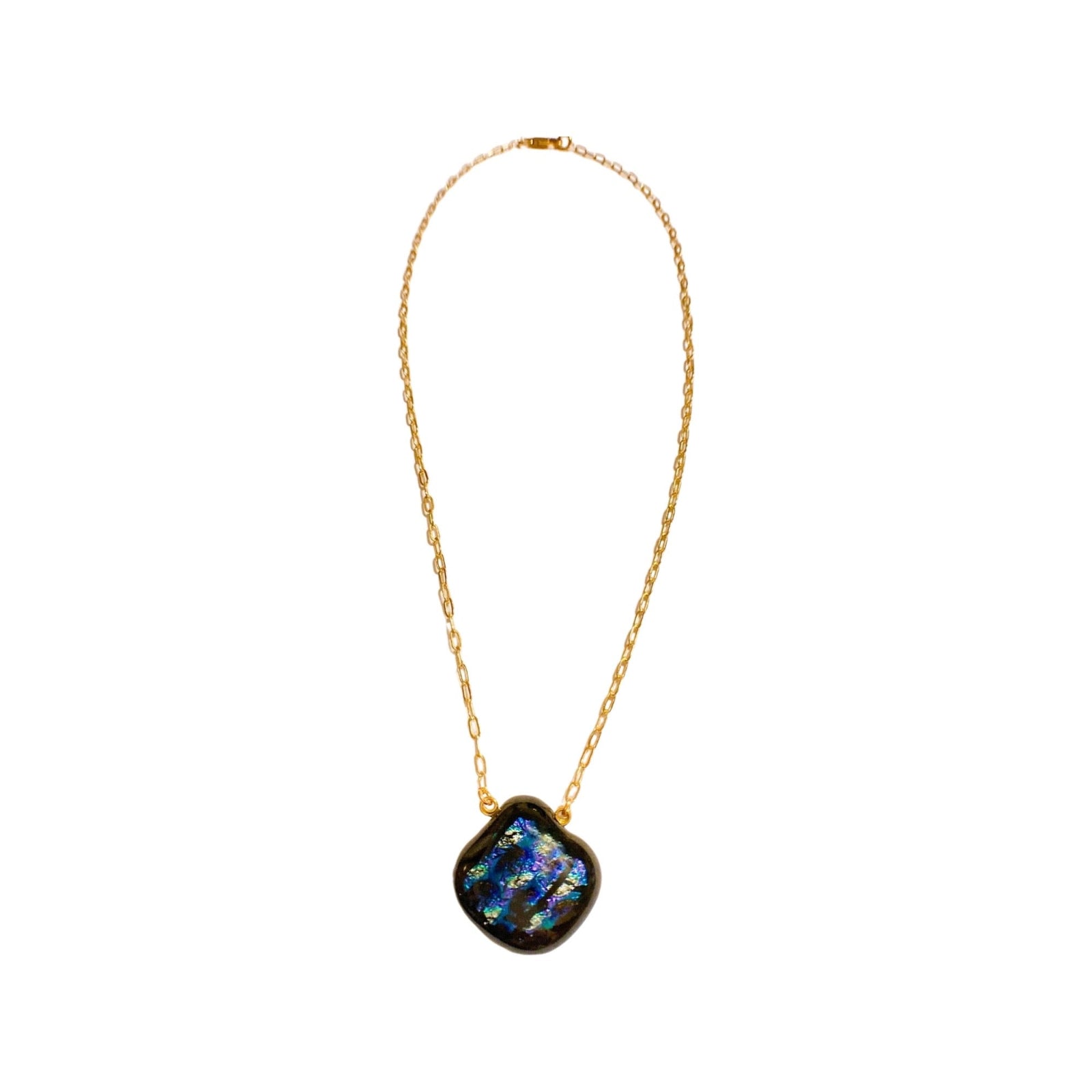 Dichroic glass necklace and gold chain against a white background, by 3D Glass Designs.