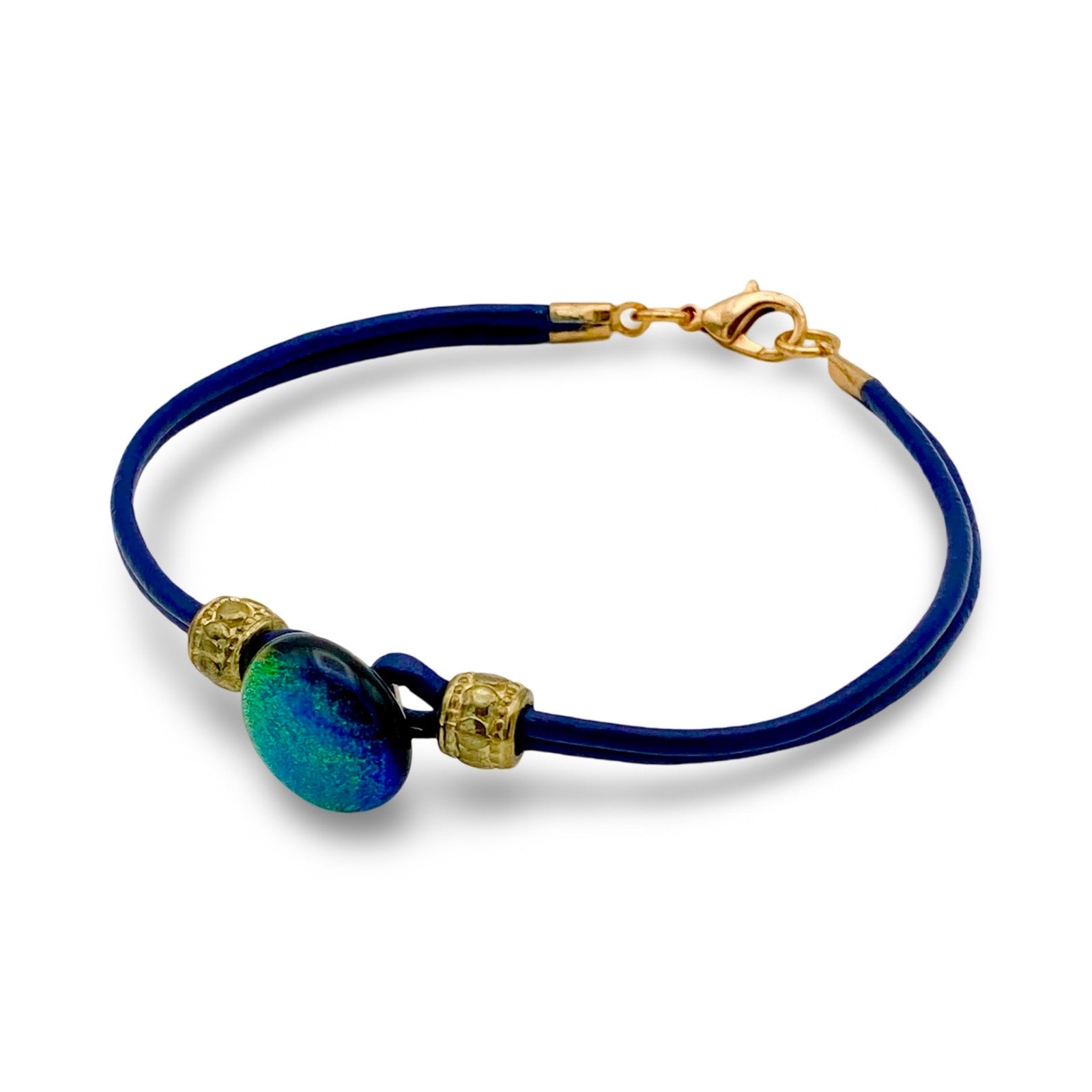 Handmade blue leather bracelet with green dichroic glass, by 3D Glass Designs.