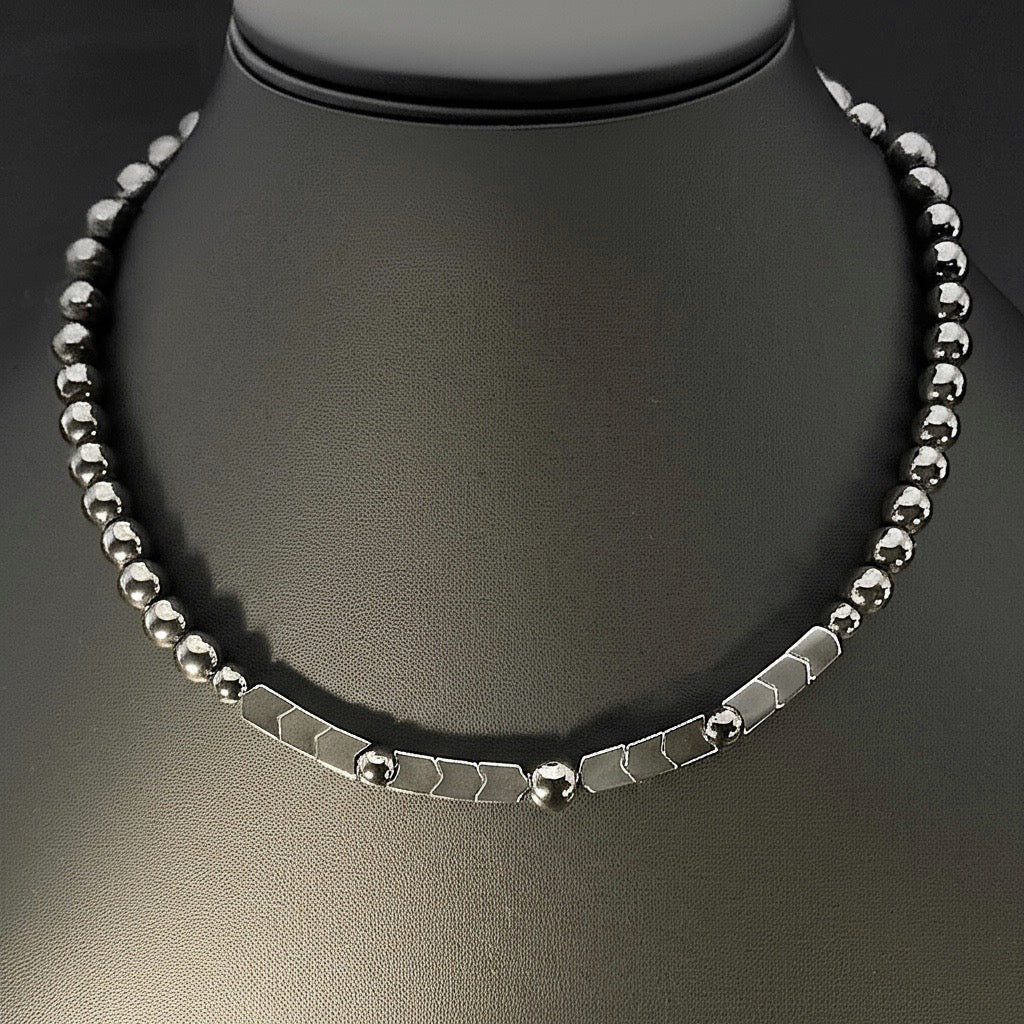 Unisex hematite beaded necklace with round and arrow shaped beads, by 3D Glass Designs.