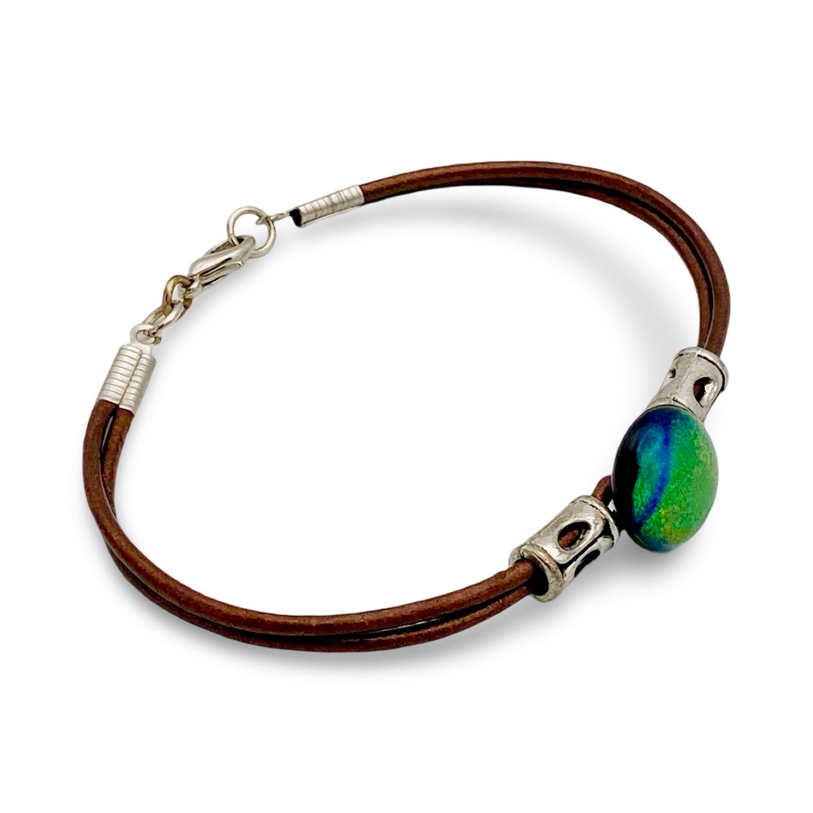 Green fused glass with metallic bronze leather cord. handmade by 3D Glass designs.