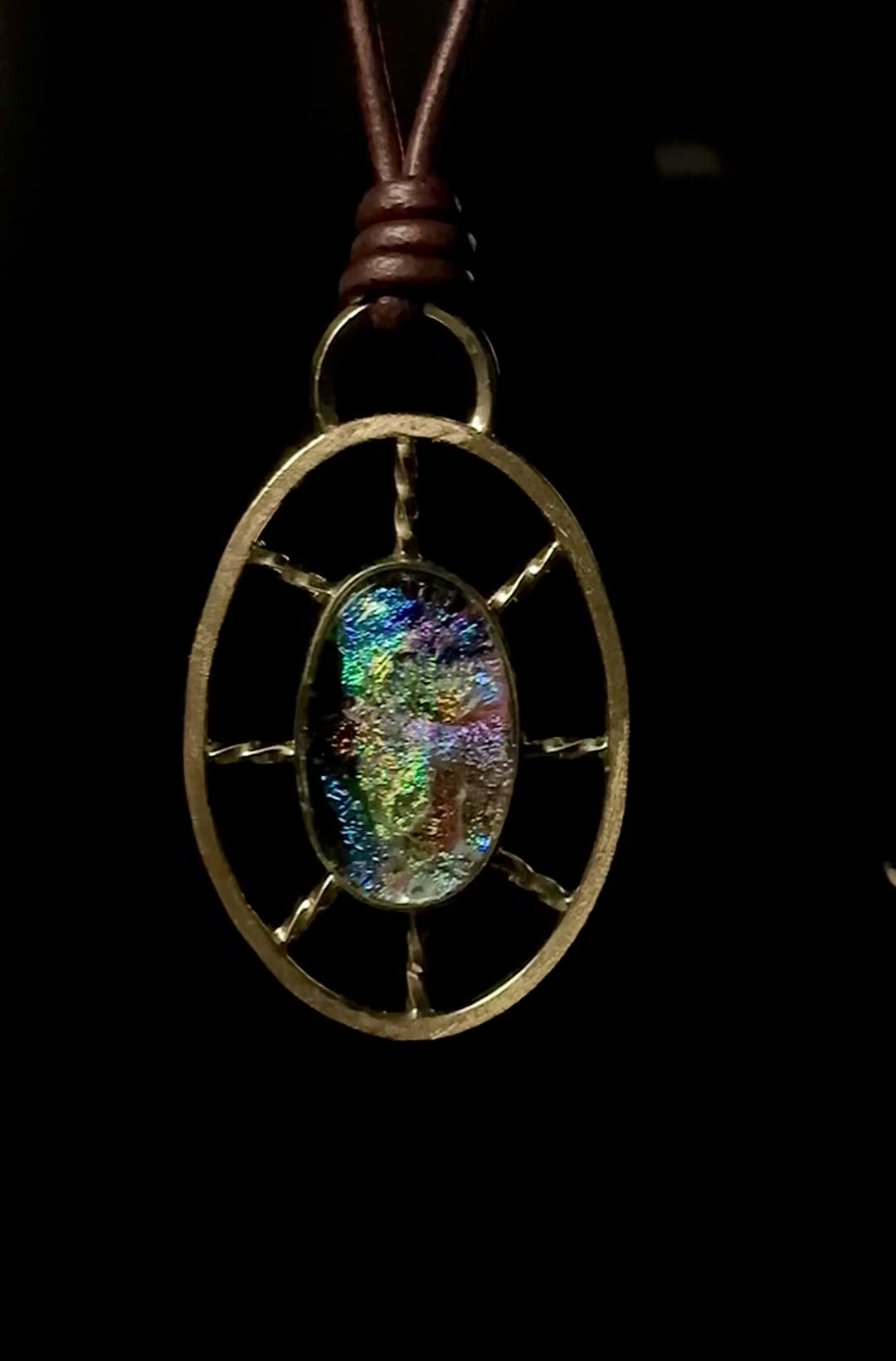 Video of nautical inspired dichroic glass and brass pendant, by 3D Glass Designs.