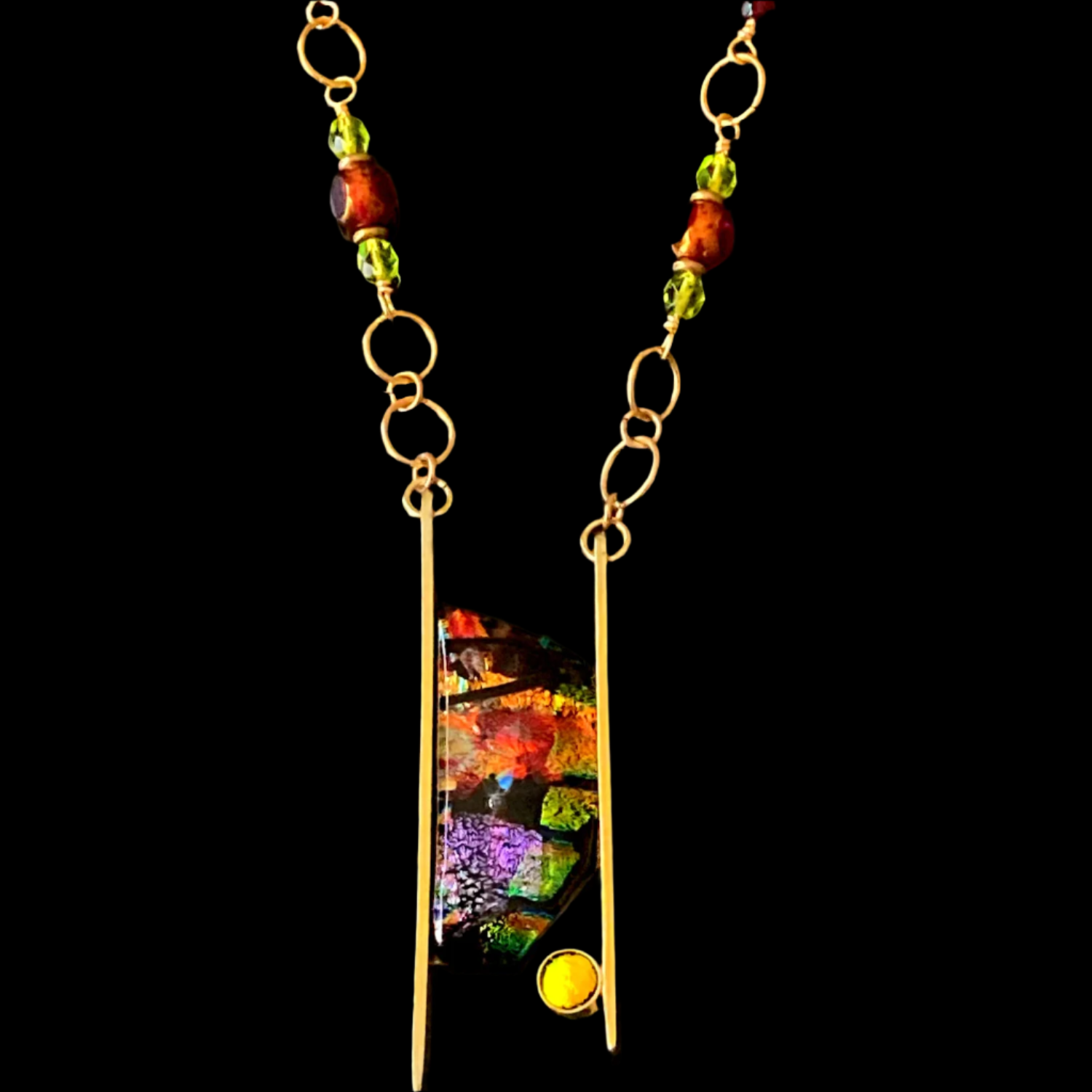 Brass pendant with colorful dichroic glass and beaded brass chain, by 3D Glass Designs.