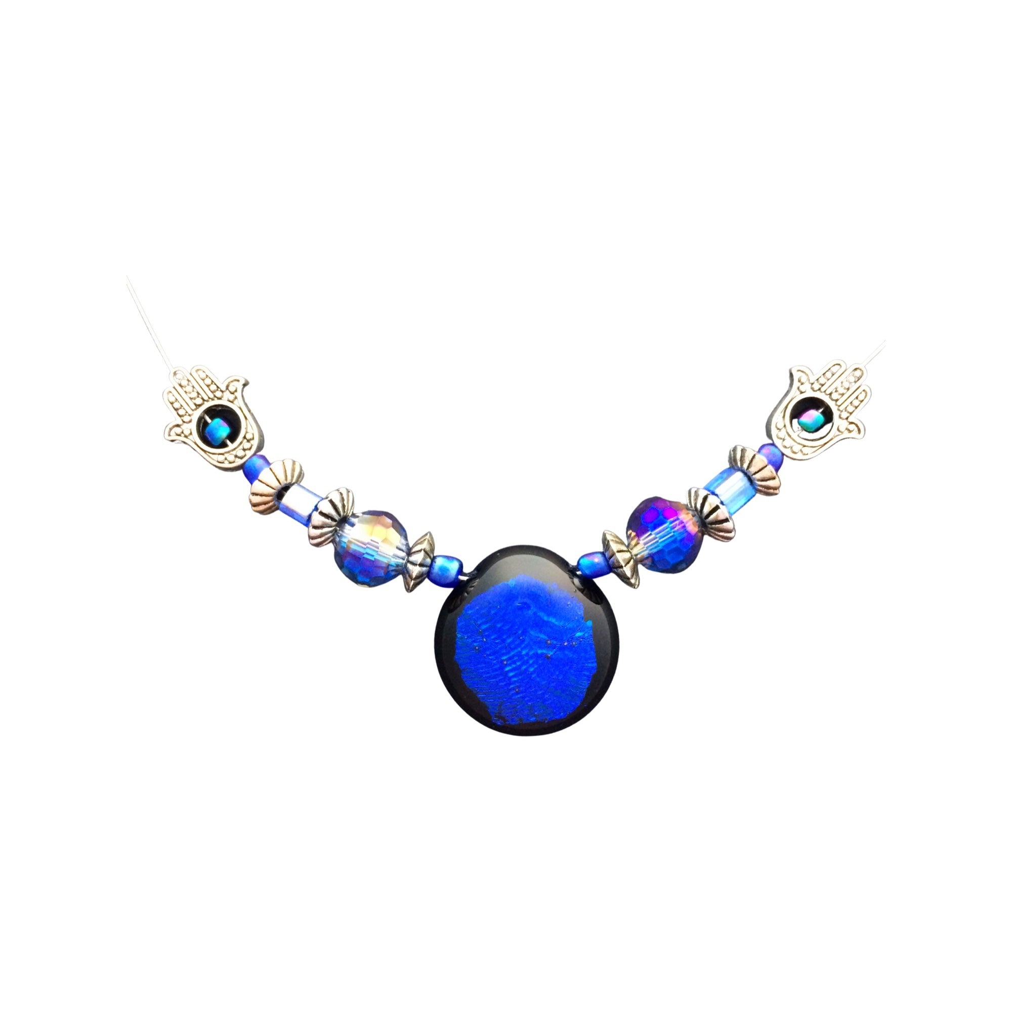 Beaded blue necklace with crystals and hamsa hand beads on a white background, by 3D Glass Designs.