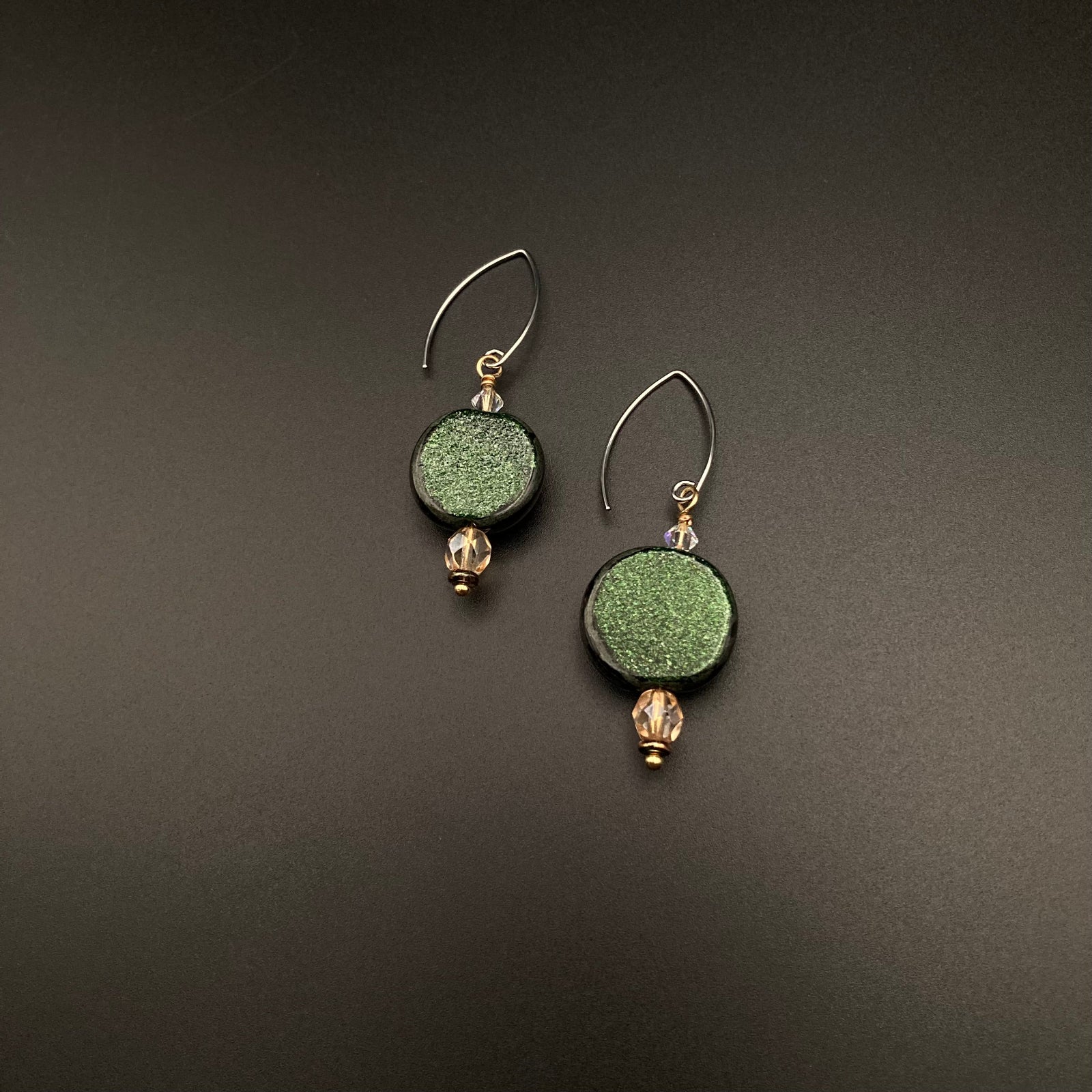 A pair of green fused glass earrings with crystals and silver-tone ear wires, by 3D Glass Designs.