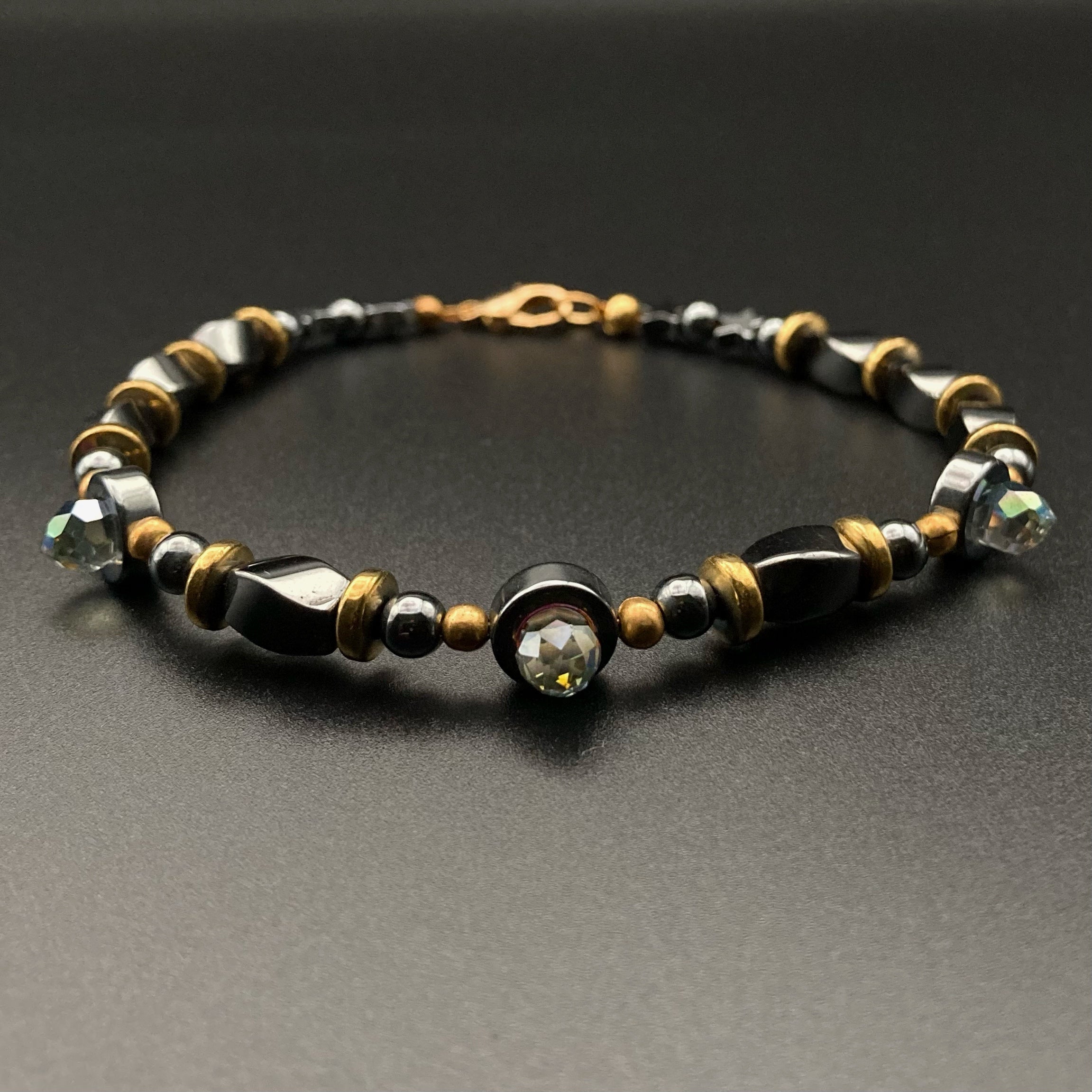 Grey and gold Hematite beaded bracelet by 3D Glass Designs.