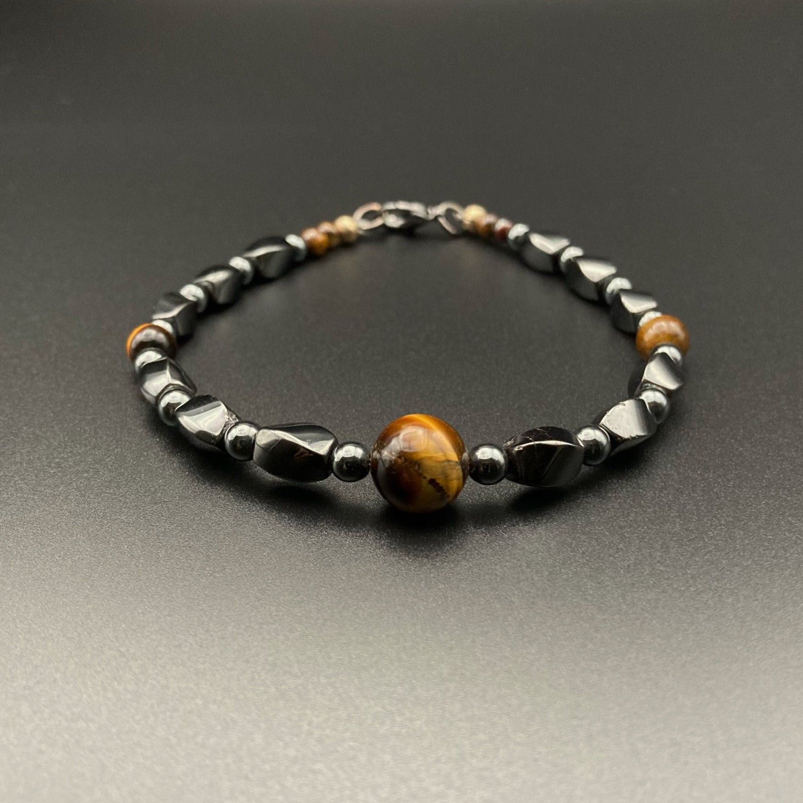 Grey and tan beaded bracelet, by 3D Glass Designs.