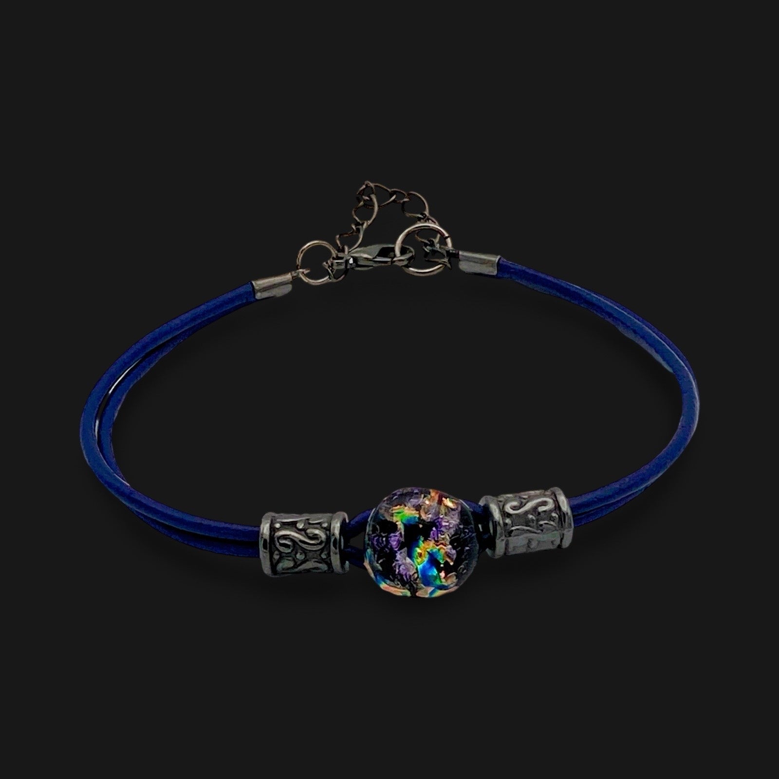 Handmade purple dichroic glass and blue leather bracelet, by 3D Glass designs.