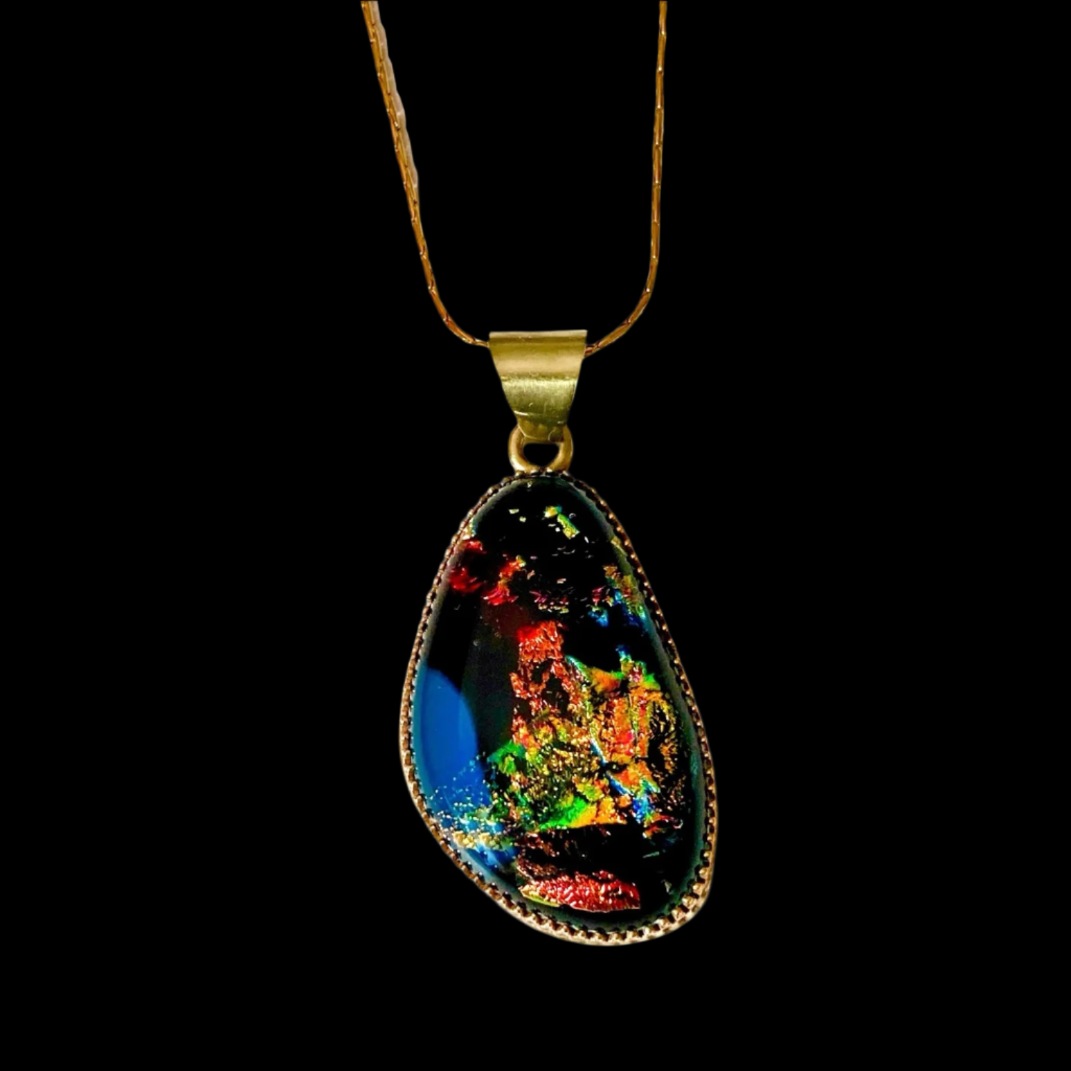 Colorful fused glass pendant in brass setting, by 3D Glass Designs.
