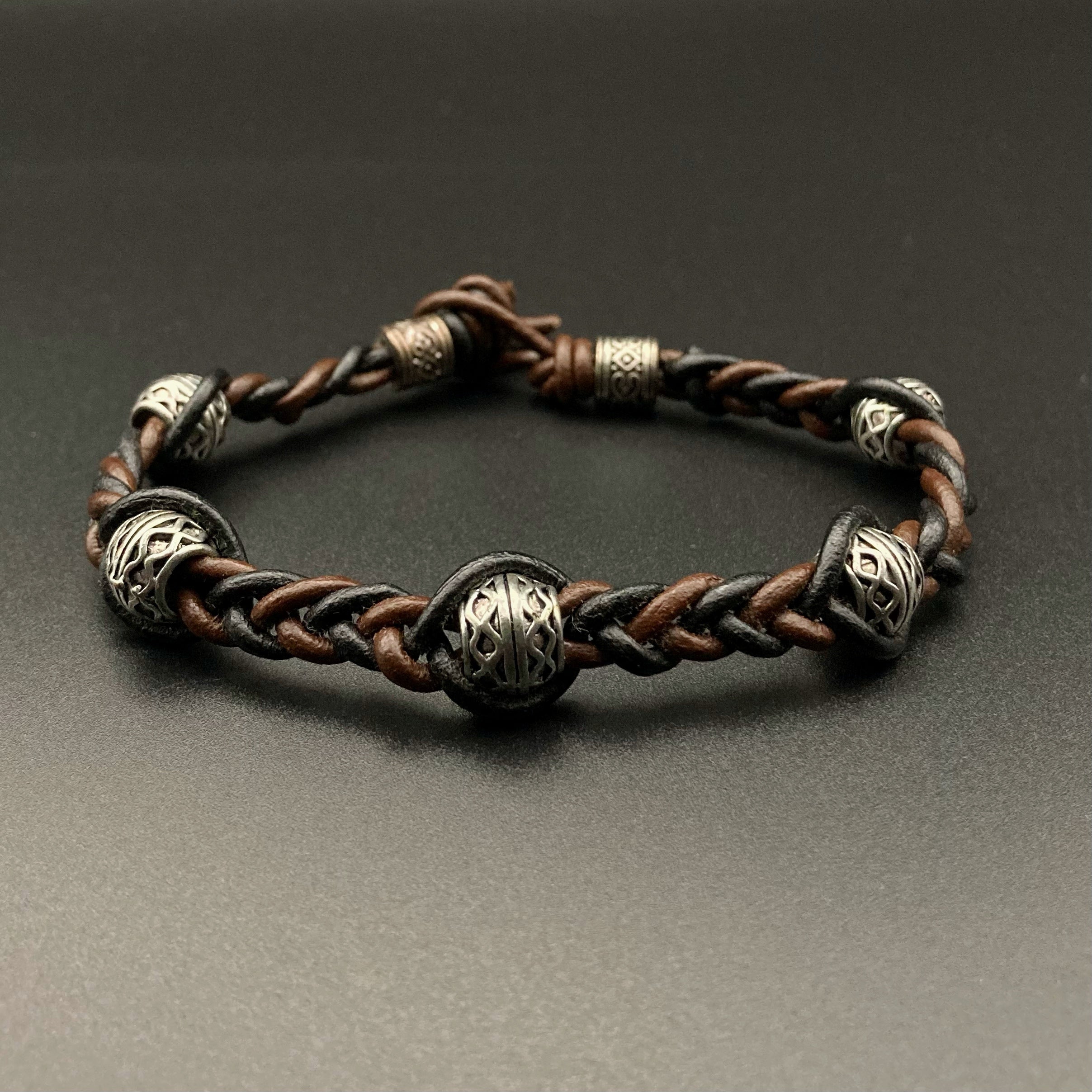 Black and brown woven leather bracelet with silver beads, by 3D Glass Designs.